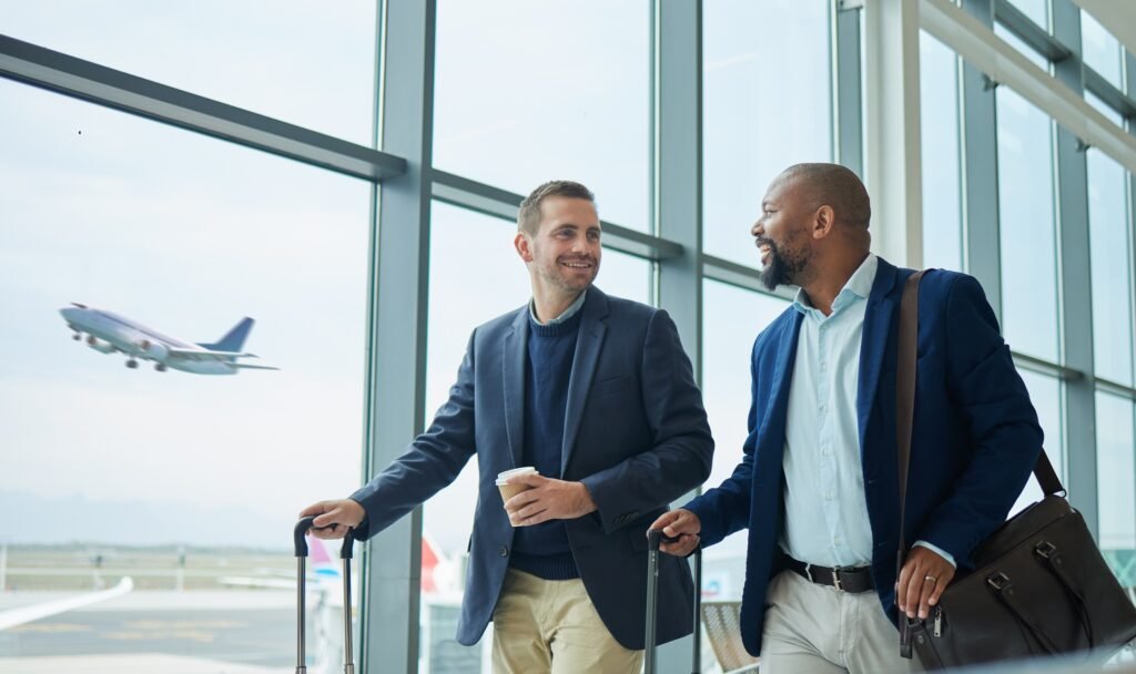 Travel,For,Business,,Team,At,Airport,And,Men,,Catch,Flight