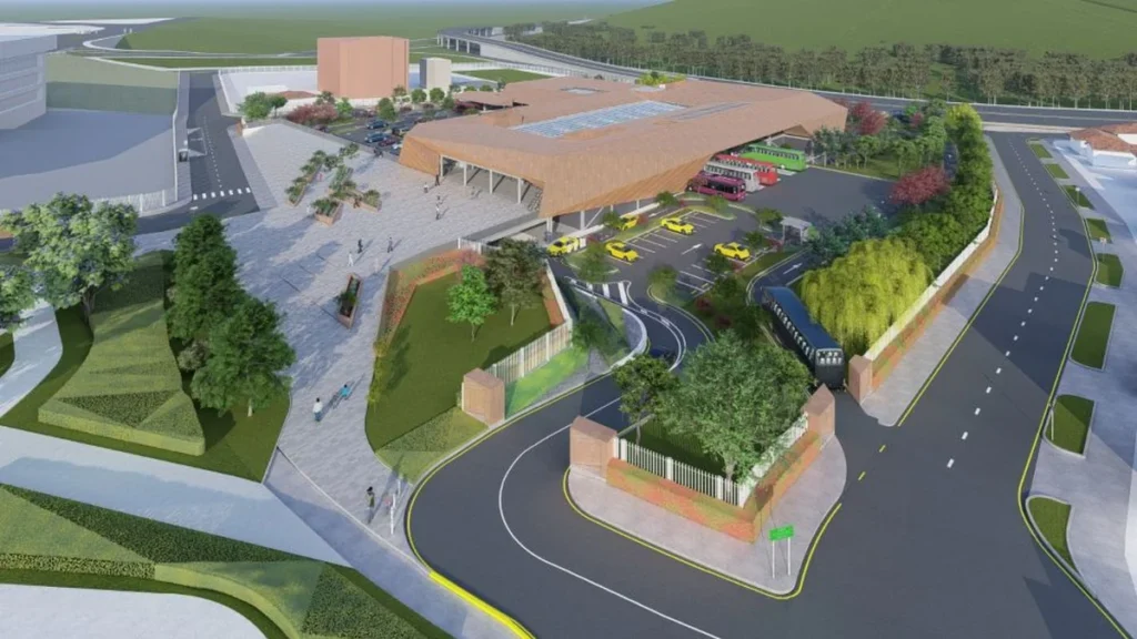 Obreros y maquinaria pesada en la construccion de la Terminal Terrestre Sur de Cuenca
