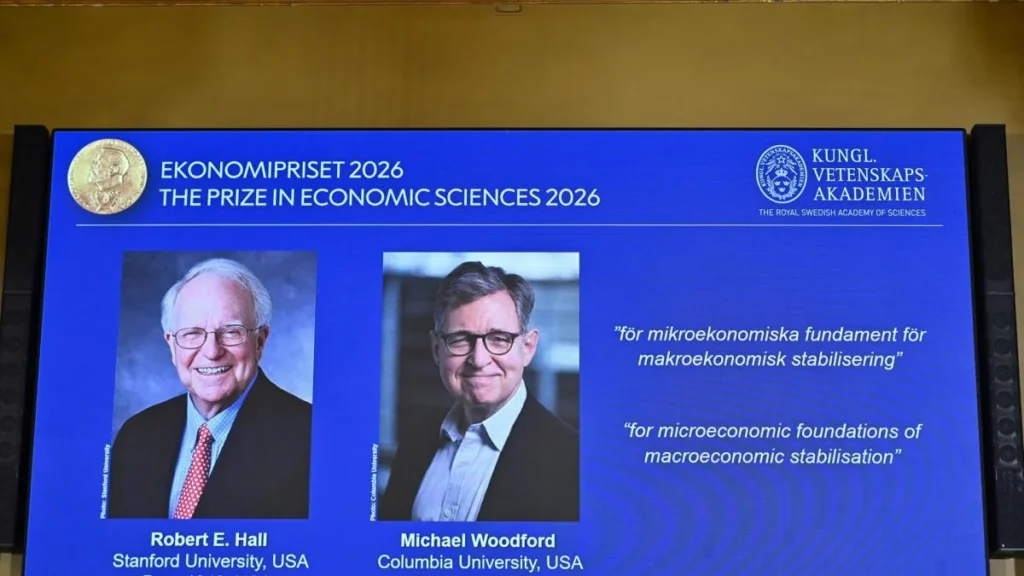 Medalla del Premio Nobel de Economía y gráficos macroeconómicos